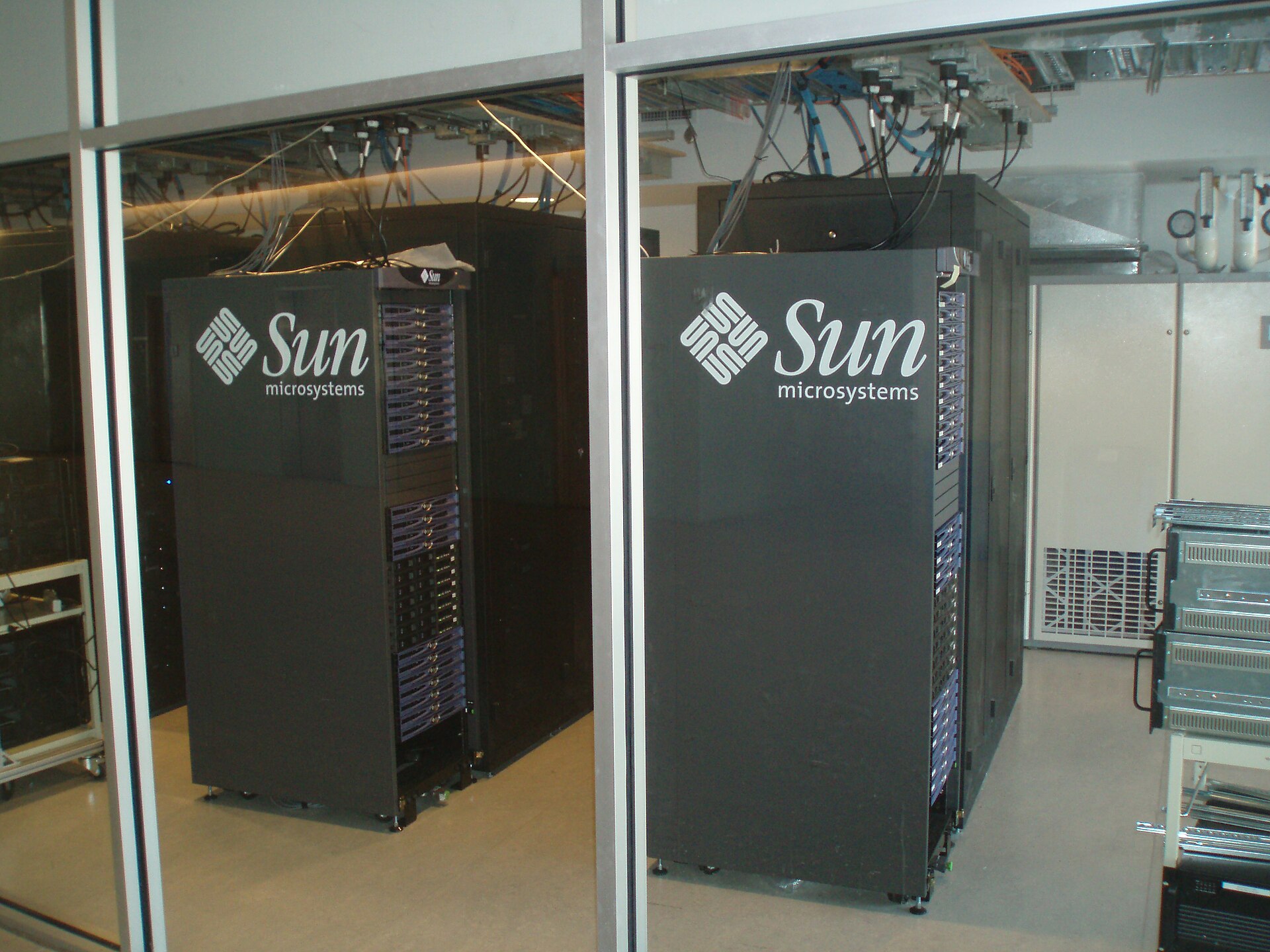 Rows of servers in a data centre, the hardware that trains large language models