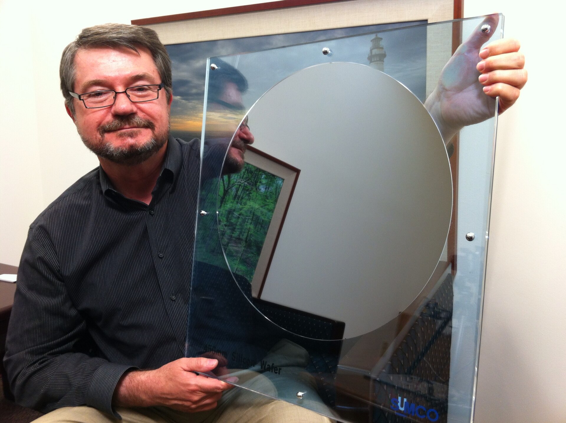 A patterned silicon wafer, the product of advanced semiconductor manufacturing
